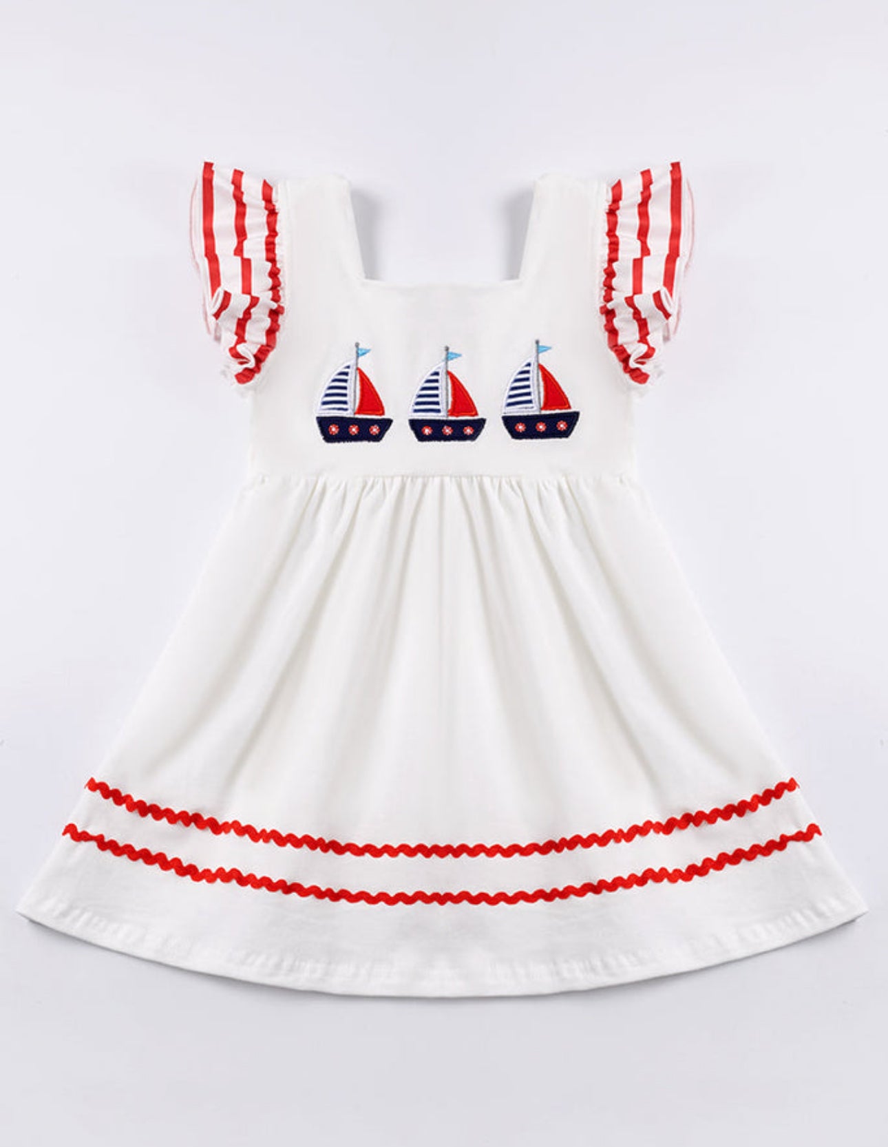 white sail boat dress