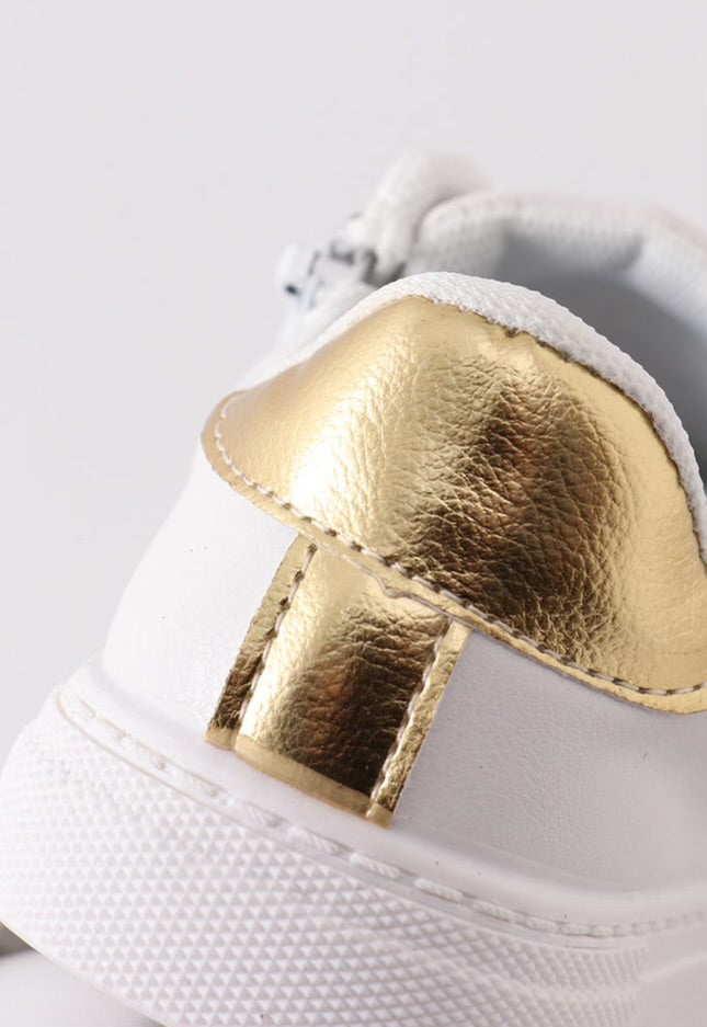 White sneakers gold star